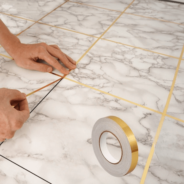 X10 - Adhésif décoratif doré 50m - ZINAMI.SHOP